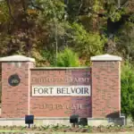 U.S. Army Fort Belvoir entrance sign promoting community support and military service.