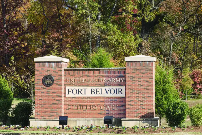 U.S. Army Fort Belvoir entrance sign promoting community support and military service.
